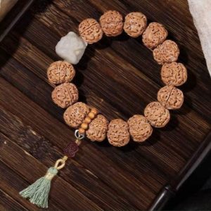 Exquisite Rudraksha Bracelet with Diverse Ornaments, Showcasing Intricate Patterns and Traditional Aesthetics, Perfect for Jewelry Enthusiasts