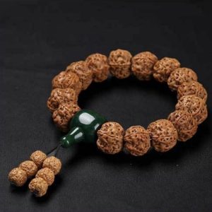 Exquisite Rudraksha Bracelet with Green Accent, Featuring Intricate Textures and Traditional Design, Ideal for Jewelry Enthusiasts